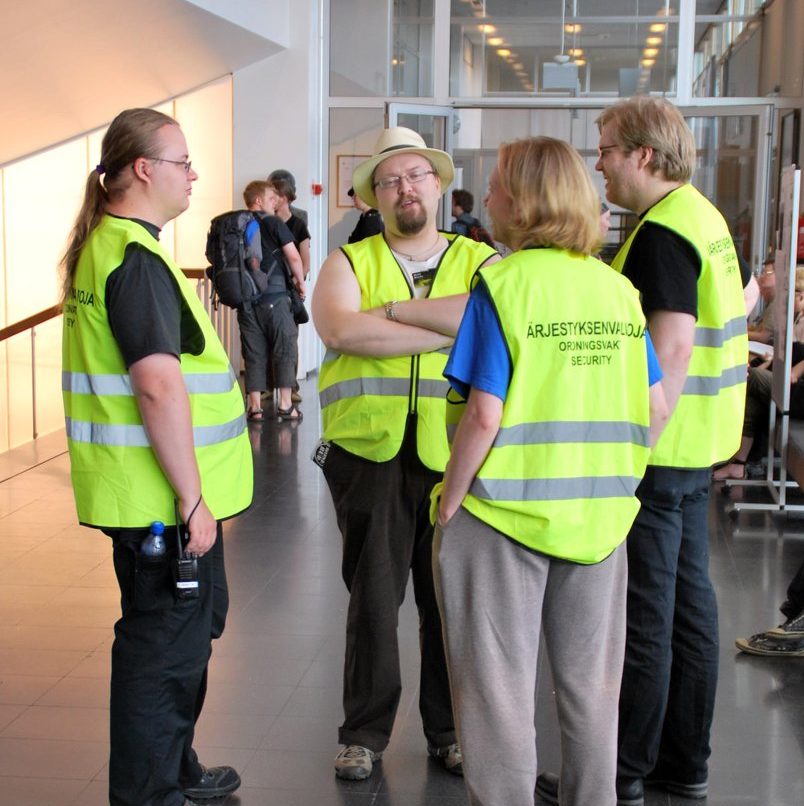 Picture of volunteers standing in a circle